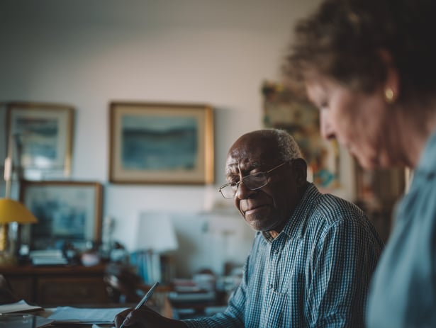 beteam._DSLR_editorial_photo_of_a_52_year_old_man_in_an_assiste_159b345c-e357-4912-97e2-f8f720aa45ea